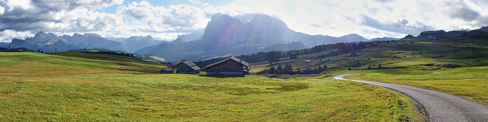 Wanderweg on Seiser Alm Panorama This wanderweg meanders across the Seiser Alm, the highest pasture in Europe, towards the Langkofel mountain group in the Dolomites...